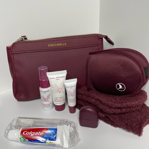 Coccinelle Handbags - Coccinelle/ Cinq Mondes travel Cosmetics bag